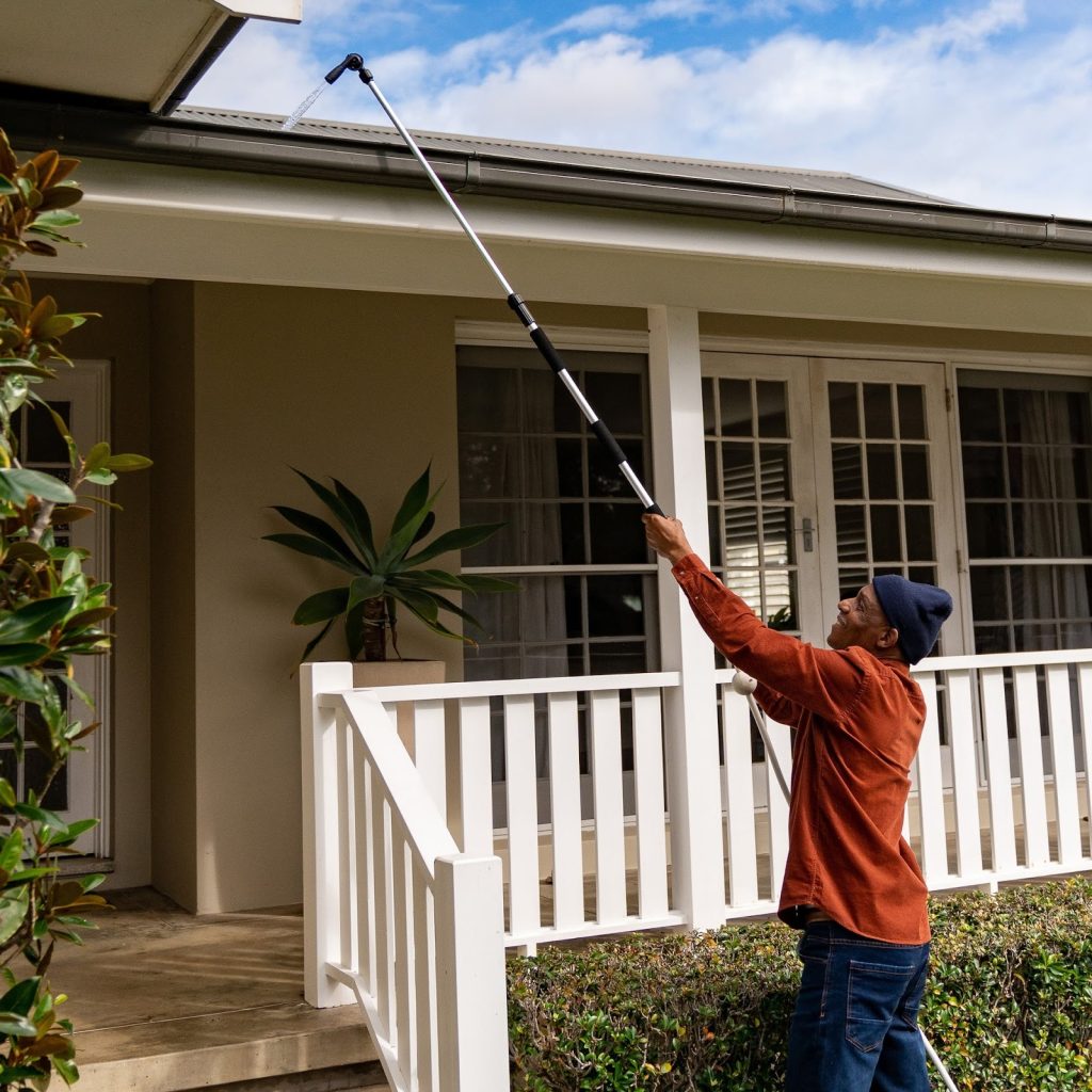 Best way to clean gutters without a ladder using water spray wand.