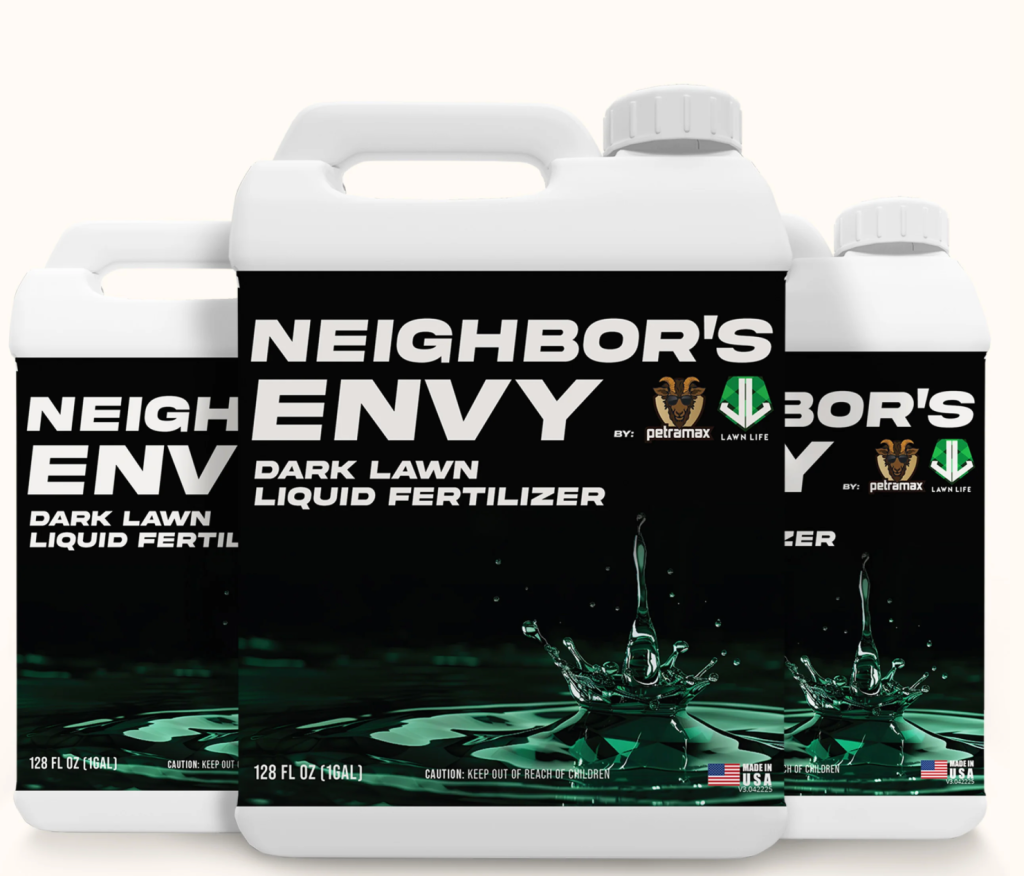 Three white 1-gallon jugs of Neighbor's Envy Dark Lawn Liquid Fertilizer by Petramax with a green liquid splash graphic.